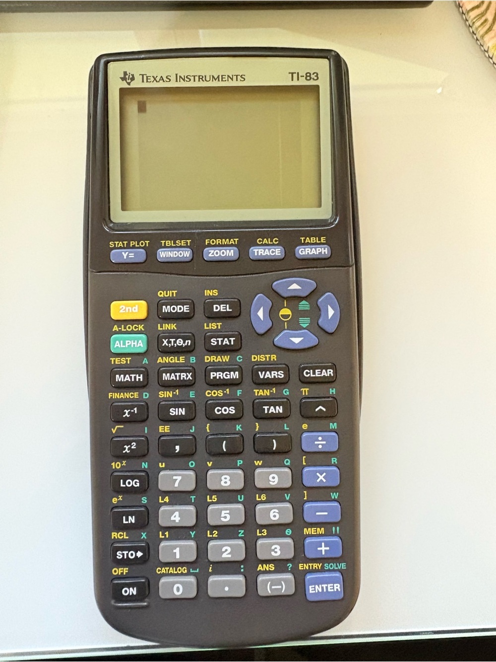 Texas Instruments TI-83 Graphing Calculator - Black with Blue and Yellow Keys